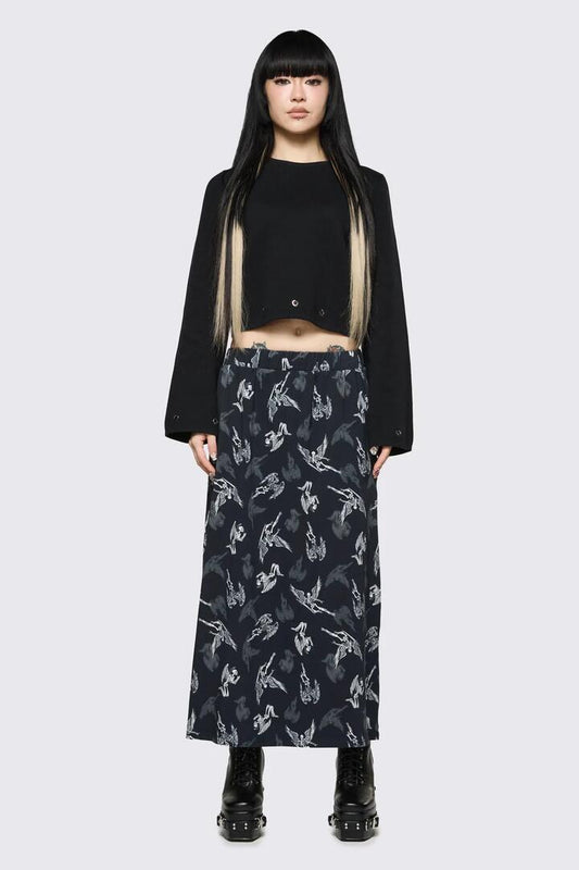 Image of a model wearing Skirts. Product name - Archangel Print Goth Midi Skirt in Black/White colour by brand - Dangerfield