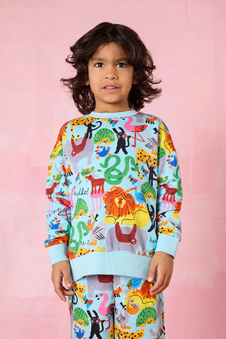 Image of a model wearing Outerwear. Product name - TaÂ DA Kids Sweater in Blue colour by brand - Gorman