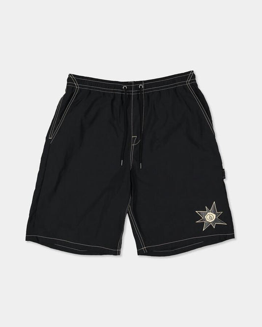 Image of a model wearing Shorts. Product name - Volcom Mens Disturb Elastic Shorts 21" Black in Black colour by brand - Volcom