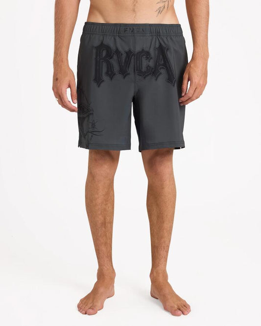 Image of a model wearing Shorts. Product name - Rvca Mens Tapout Fight Scrapper 17" Fighting Shorts Black in Black colour by brand - Rvca