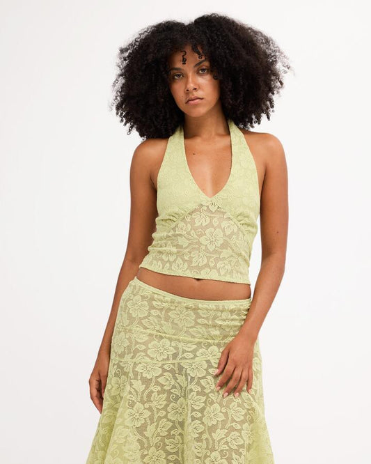 Image of a model wearing Tops. Product name - Billabong Womens Paisley Lace Tank Top Smoke Green in Smoke Green colour by brand - Billabong