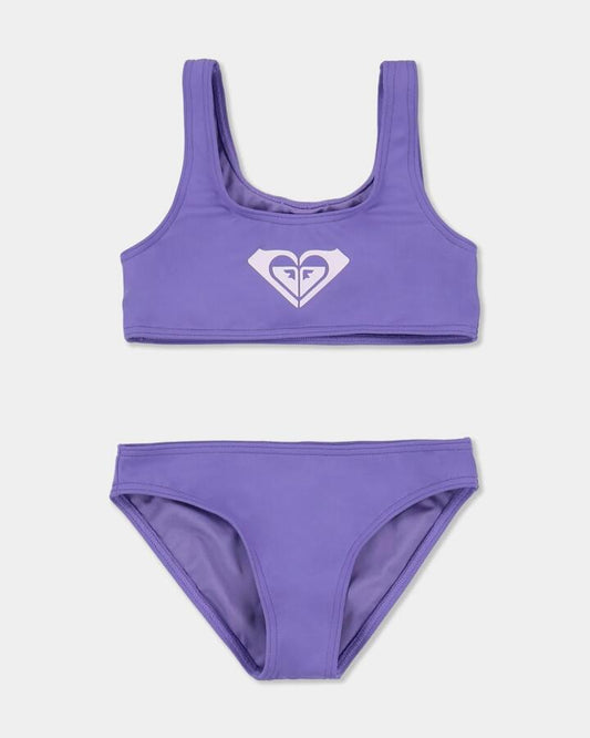 Image of a model wearing Tops. Product name - Roxy Girls 2-7 Tiny Tides Bralette Two Piece Dahlia Purple in Dahlia Purple colour by brand - Roxy