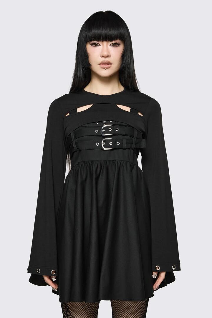 Image of a model wearing Tops. Product name - Cindy Cut Out Sleeves in Black colour by brand - Dangerfield