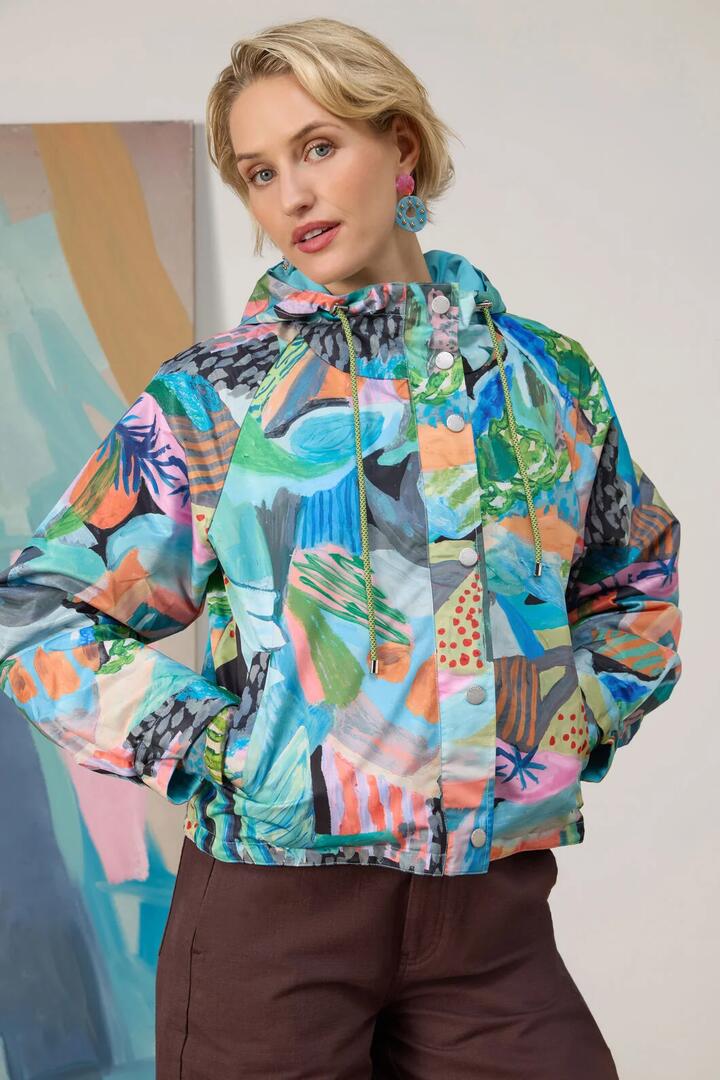 Image of a model wearing Rain Coats. Product name - Endless Horizon Reversible Jacket in Print colour by brand - Gorman
