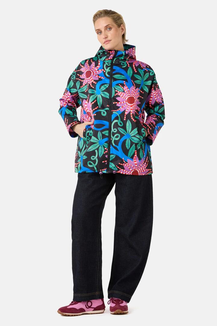 Image of a model wearing Rain Coats. Product name - Passion Flower Raincoat in Print colour by brand - Gorman