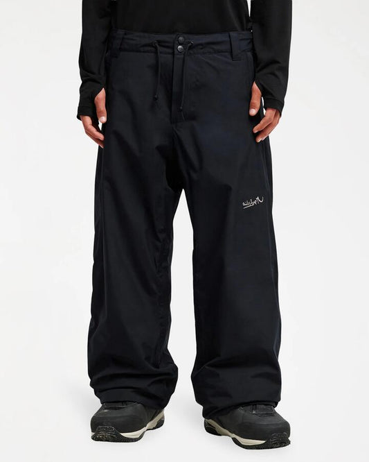 Image of a model wearing Pants. Product name - Quiksilver Mens Young Guns Gore-Tex Snow Pants Black in Black colour by brand - Quiksilver