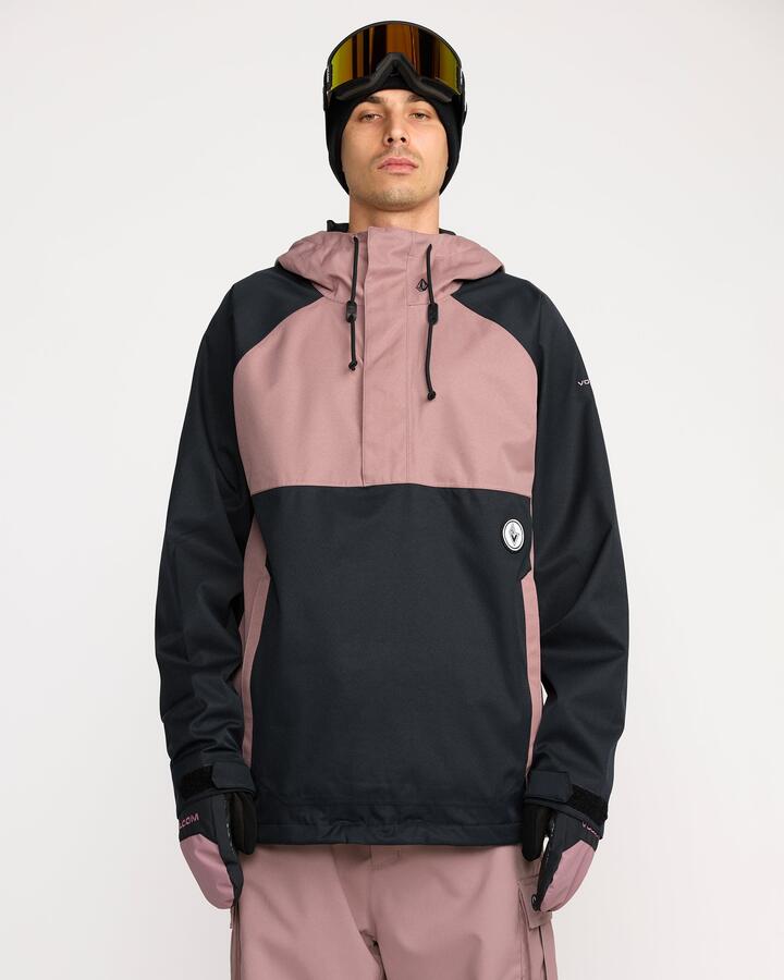 Image of a model wearing Outerwear. Product name - Volcom Hossegor 20K Pullover Military in Military colour by brand - Volcom