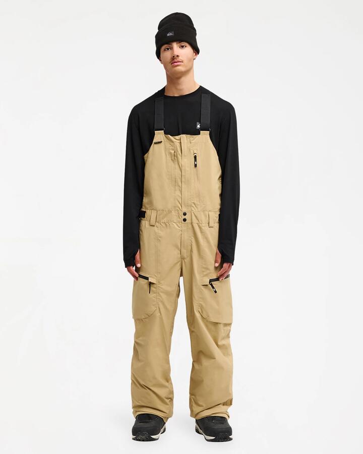 Image of a model wearing Pants. Product name - Quiksilver Mens Altostratus Stret Gore-Tex Bib Snow Pants Kelp in Kelp colour by brand - Quiksilver