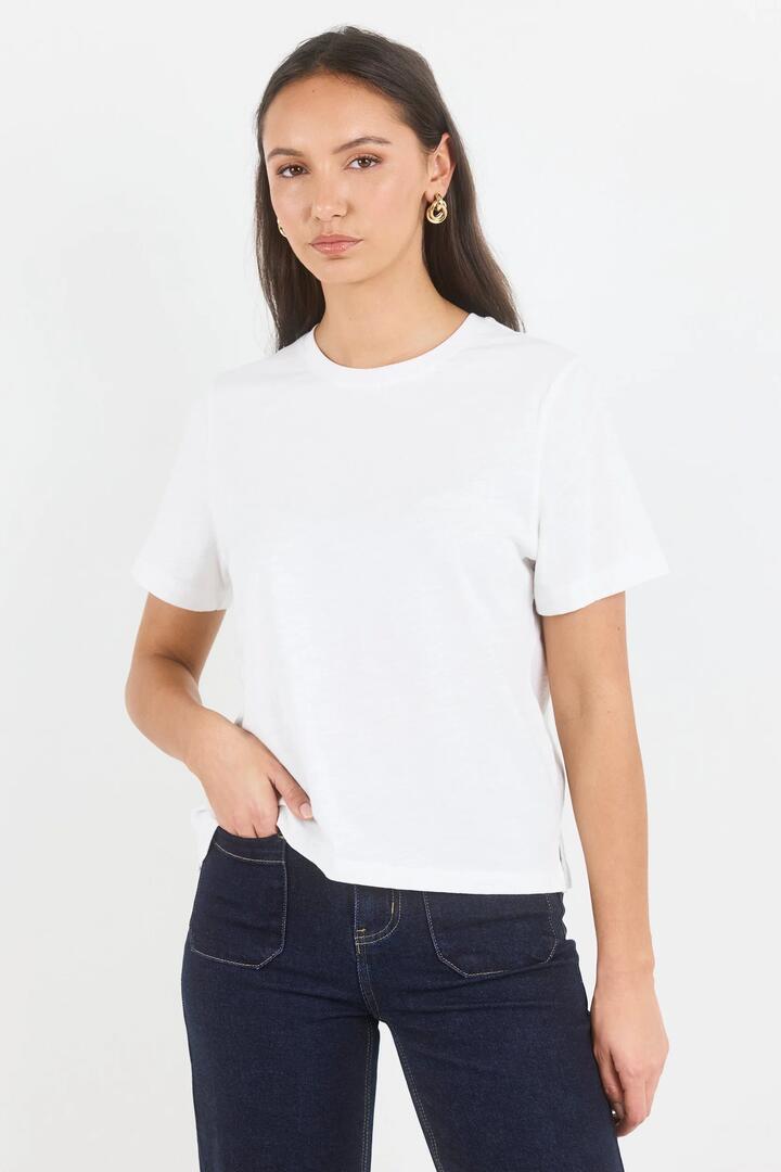 Image of a model wearing Tops. Product name - Ultimate White Slub Crew Neck Tee in White colour by brand - RE:UNION Label