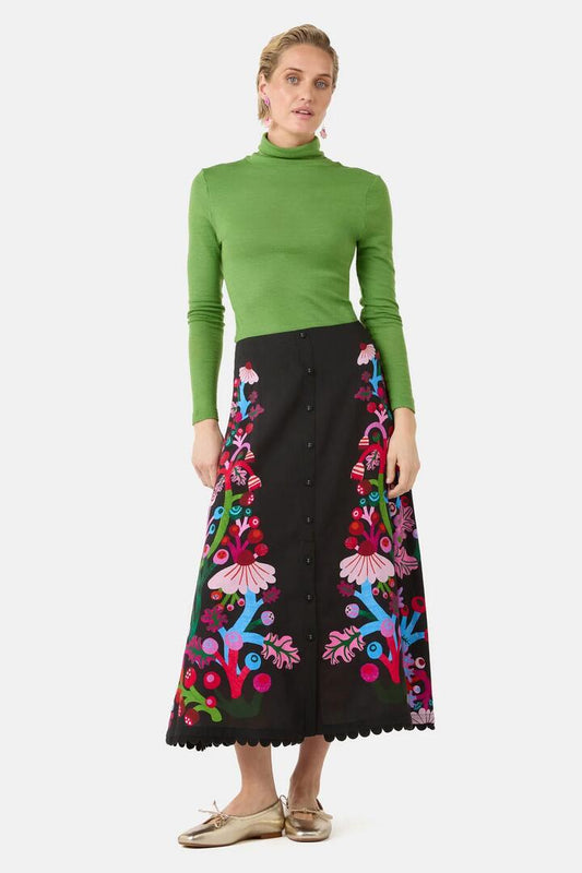 Image of a model wearing Skirts. Product name - Wild Garden Midi Skirt in Print colour by brand - Gorman