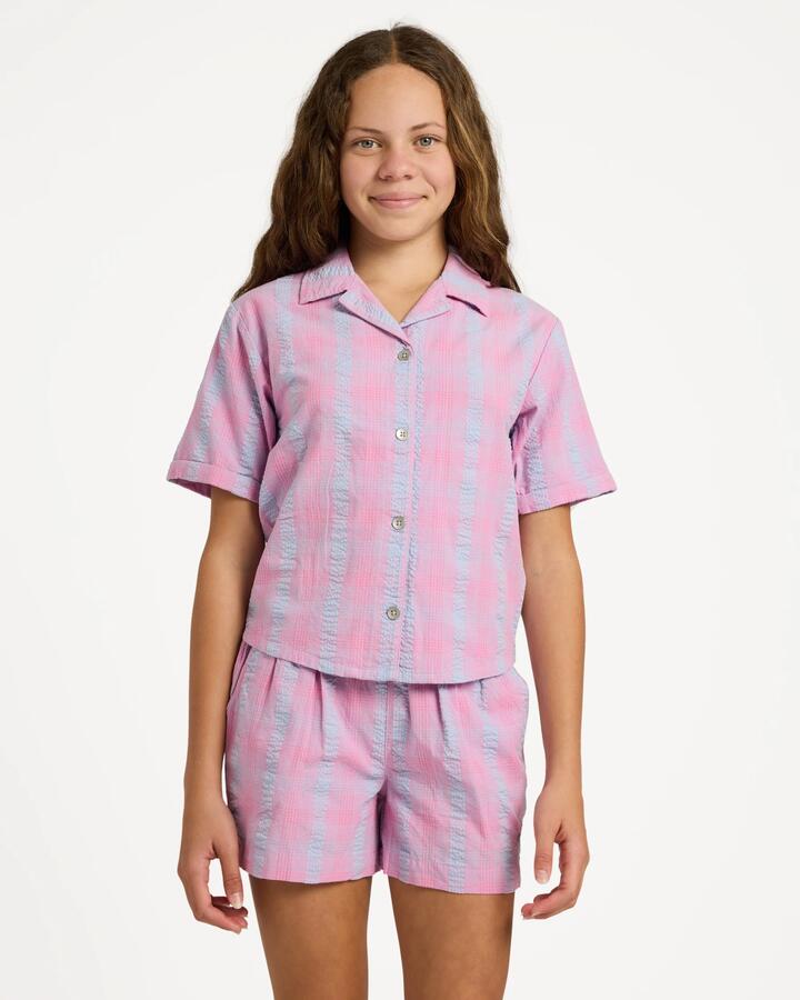 Image of a model wearing Shorts. Product name - Roxy Girls 8-16 Phoebe Check Woven Shorts Fuchsia Pink in Fuchsia Pink colour by brand - Roxy