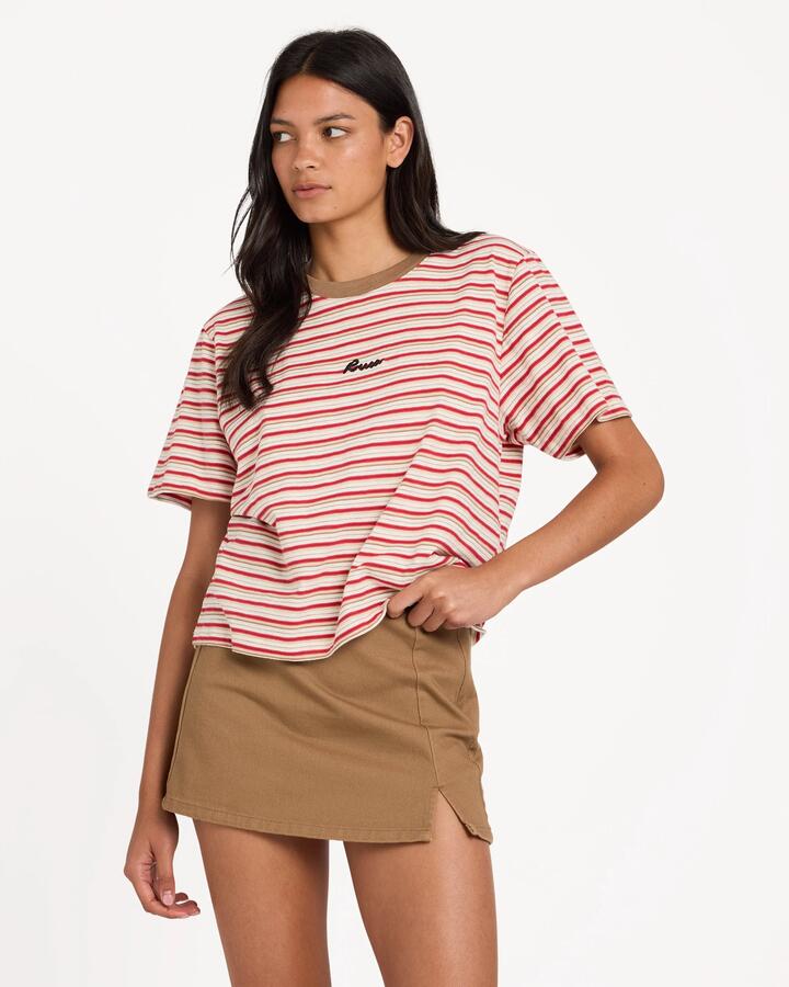 Image of a model wearing Skirts. Product name - Rvca Womens Reform Mini Skirt Cocoa in Cocoa colour by brand - Rvca