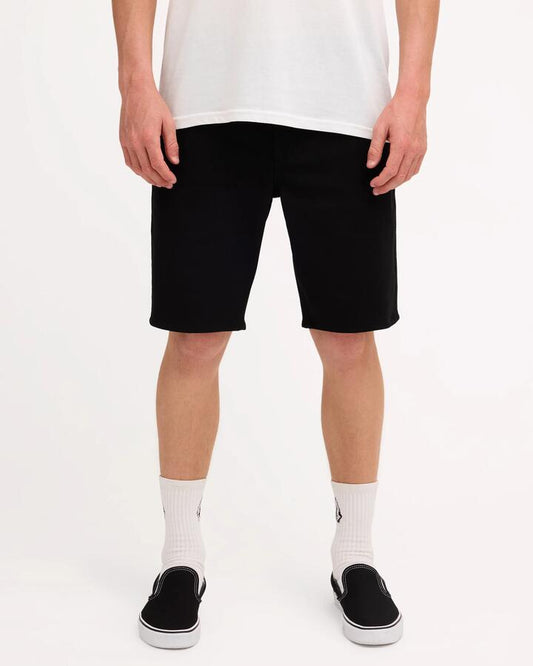 Image of a model wearing Shorts. Product name - Volcom Mens Modown Twill Shorts Black in Black colour by brand - Volcom