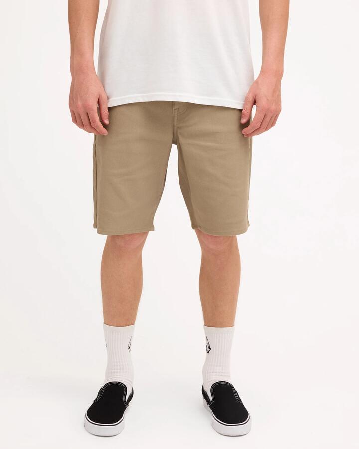 Image of a model wearing Shorts. Product name - Volcom Mens Modown Twill Shorts Khaki in Khaki colour by brand - Volcom