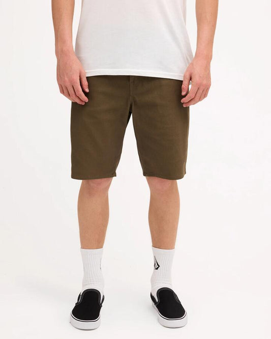 Image of a model wearing Shorts. Product name - Volcom Mens Modown Twill Shorts Wintermoss in Wintermoss colour by brand - Volcom