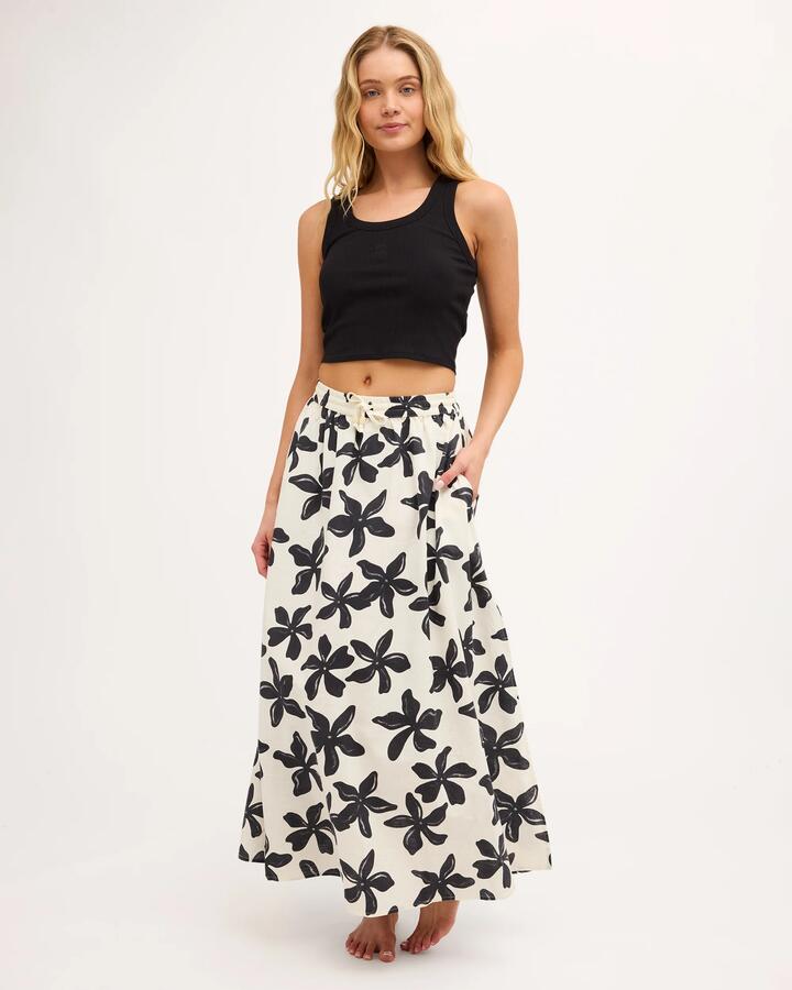 Image of a model wearing Skirts. Product name - Billabong Womens Dusk To Dawn Maxi Skirt White Cap in White Cap colour by brand - Billabong