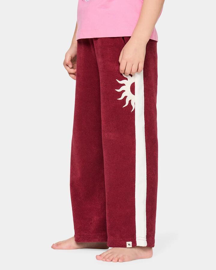 Image of a model wearing Pants. Product name - Rip Curl Girls 2-7 Road Trip Terry Pants Plum in Plum colour by brand - Rip Curl