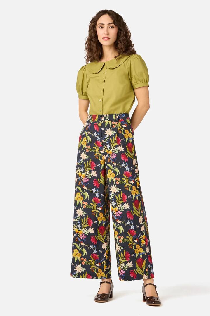Image of a model wearing Pants. Product name - Fairy Wren Wide Leg Pant in Navy colour by brand - Princess Highway
