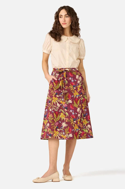 Image of a model wearing Skirts. Product name - Fairy Wren Midi Skirt in Plum colour by brand - Princess Highway