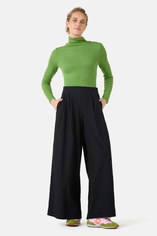 Image of a model wearing Skirts. Product name - Calliope Seersucker Skort in Black colour by brand - Gorman