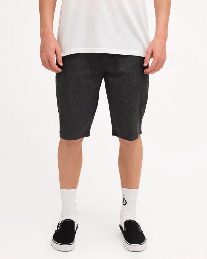 Image of a model wearing Shorts. Product name - Volcom Mens Unhinged Chino Shorts Charcoal Heather in Charcoal Heather colour by brand - Volcom