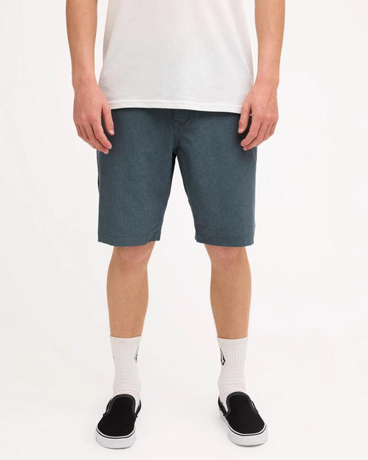 Image of a model wearing Shorts. Product name - Volcom Mens Kerosene Chino Shorts Dark Slate in Dark Slate colour by brand - Volcom