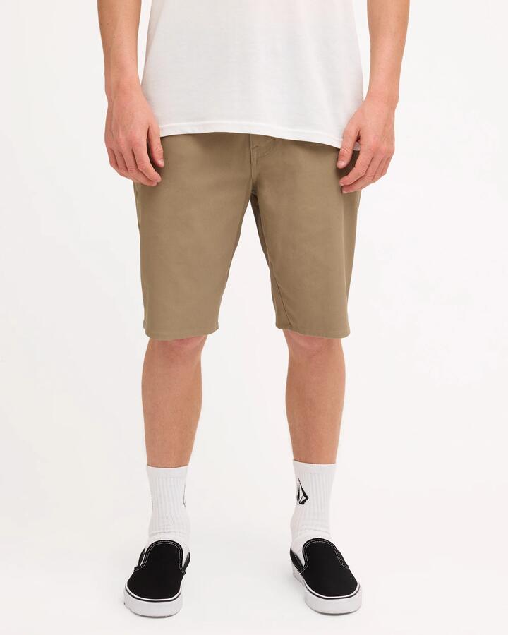 Image of a model wearing Shorts. Product name - Volcom Mens Unhinged Chino Shorts Khaki in Khaki colour by brand - Volcom