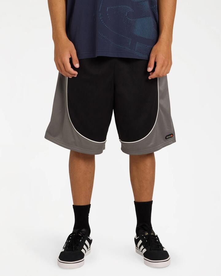 Image of a model wearing Shorts. Product name - Billabong Mens Spec 73 Mesh Shorts Black in Black colour by brand - Billabong