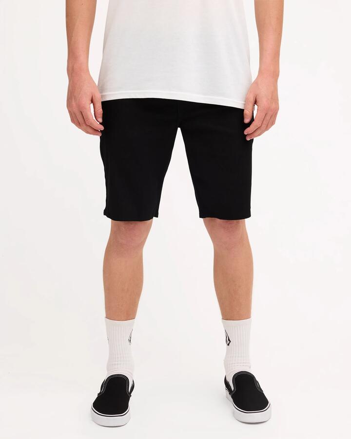 Image of a model wearing Shorts. Product name - Volcom Mens Solver Twill Shorts Black in Black colour by brand - Volcom