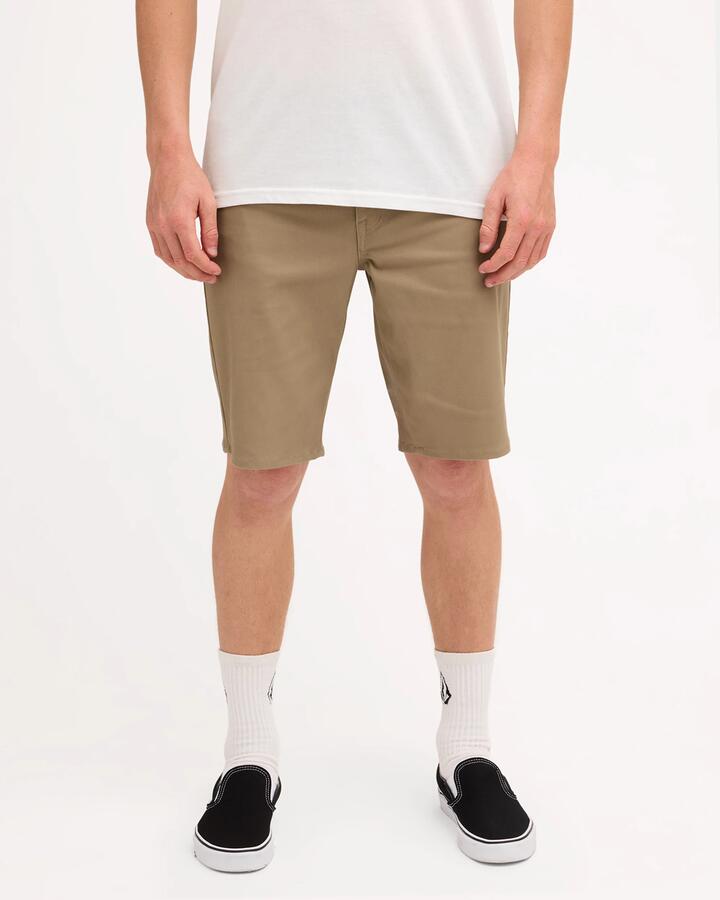 Image of a model wearing Shorts. Product name - Volcom Mens Solver Twill Shorts Khaki in Khaki colour by brand - Volcom