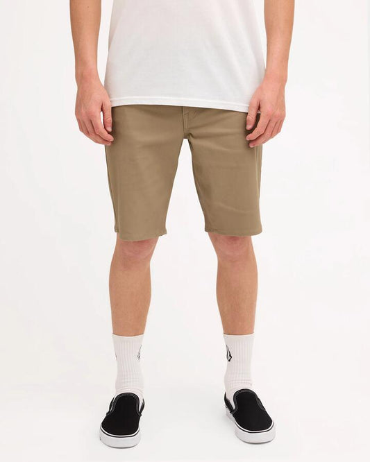 Image of a model wearing Shorts. Product name - Volcom Mens Solver Twill Shorts Khaki in Khaki colour by brand - Volcom