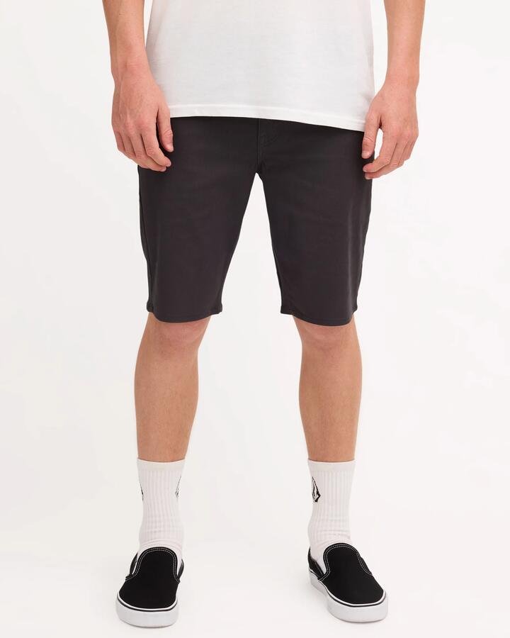Image of a model wearing Shorts. Product name - Volcom Mens Solver Twill Shorts Stealth in Stealth colour by brand - Volcom