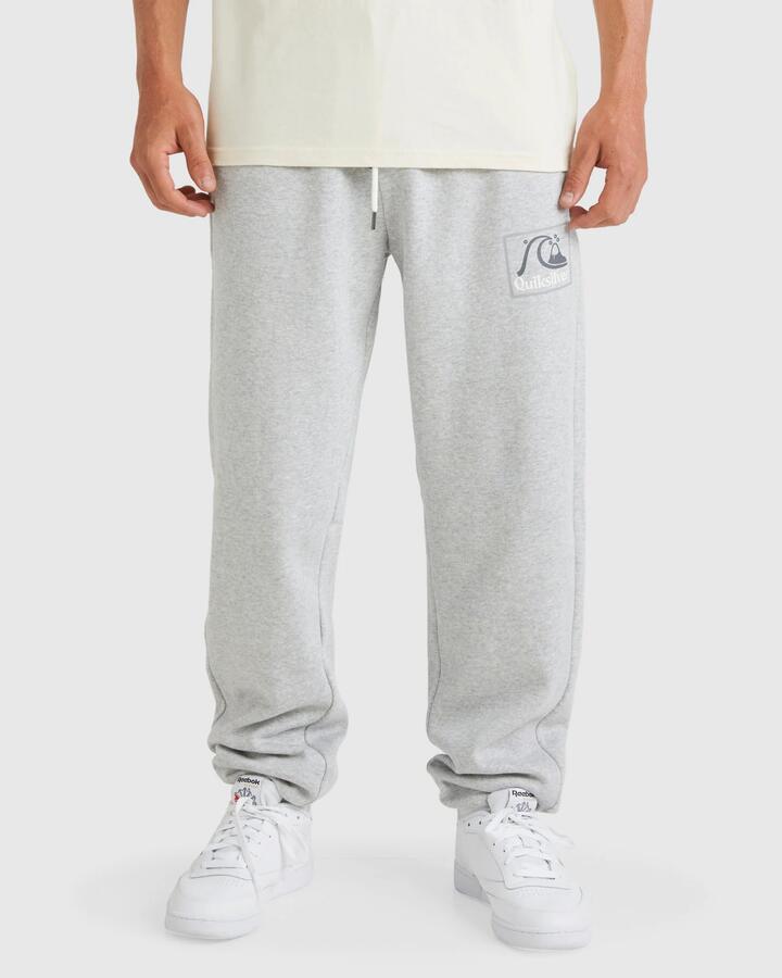 Image of a model wearing Pants. Product name - Quiksilver Mens Screen Trackpants Athletic Heather in Athletic Heather colour by brand - Quiksilver