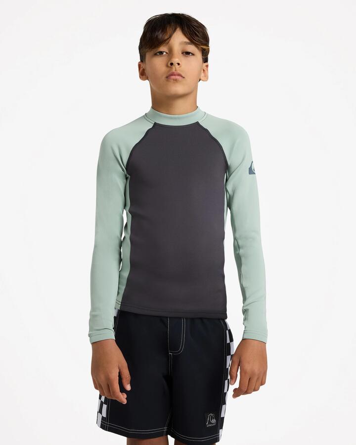 Image of a model wearing Tops. Product name - Quiksilver Boys 8-16 Everyday Heat Long Sleeve Rash Vest Iceberg Green in Iceberg Green colour by brand - Quiksilver