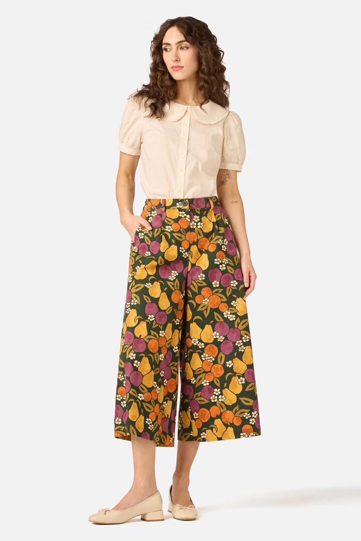 Image of a model wearing Pants. Product name - Fancy Fruit Culotte in Green colour by brand - Princess Highway
