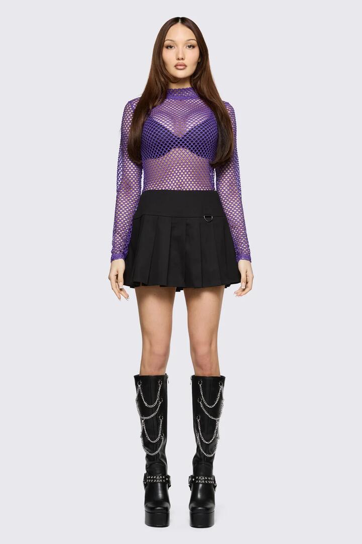 Image of a model wearing Skirts. Product name - Bang Bang Pleated Skirt in Black colour by brand - Black Friday