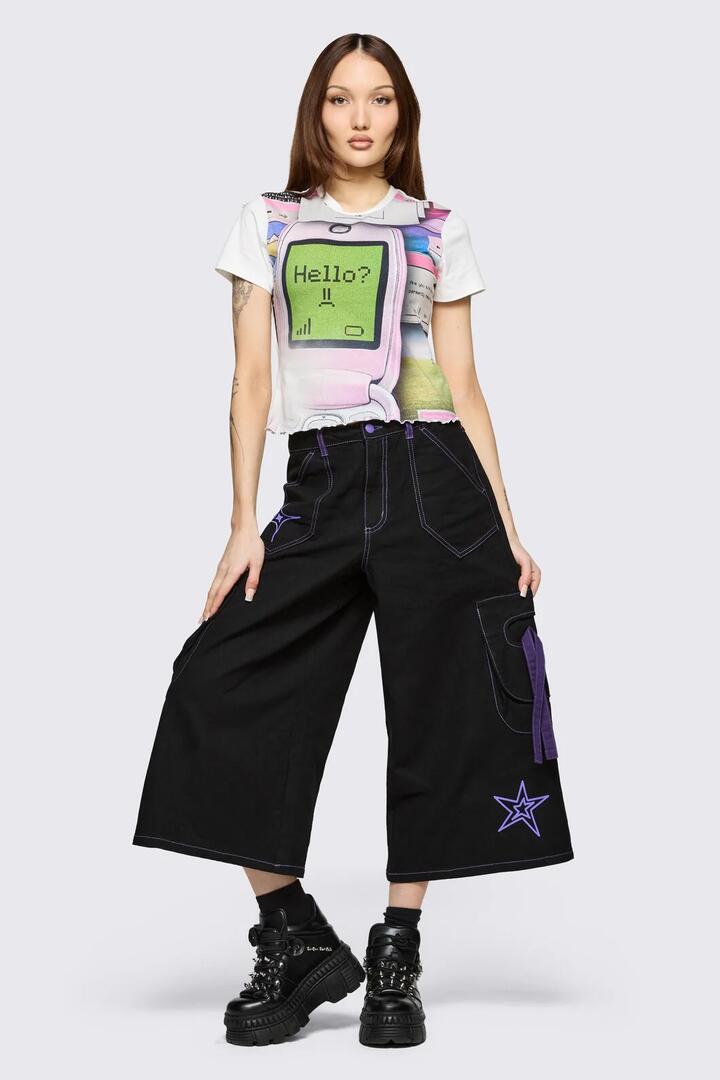 Image of a model wearing Pants. Product name - Hot Issue Baggy Pant in Black colour by brand - Black Friday