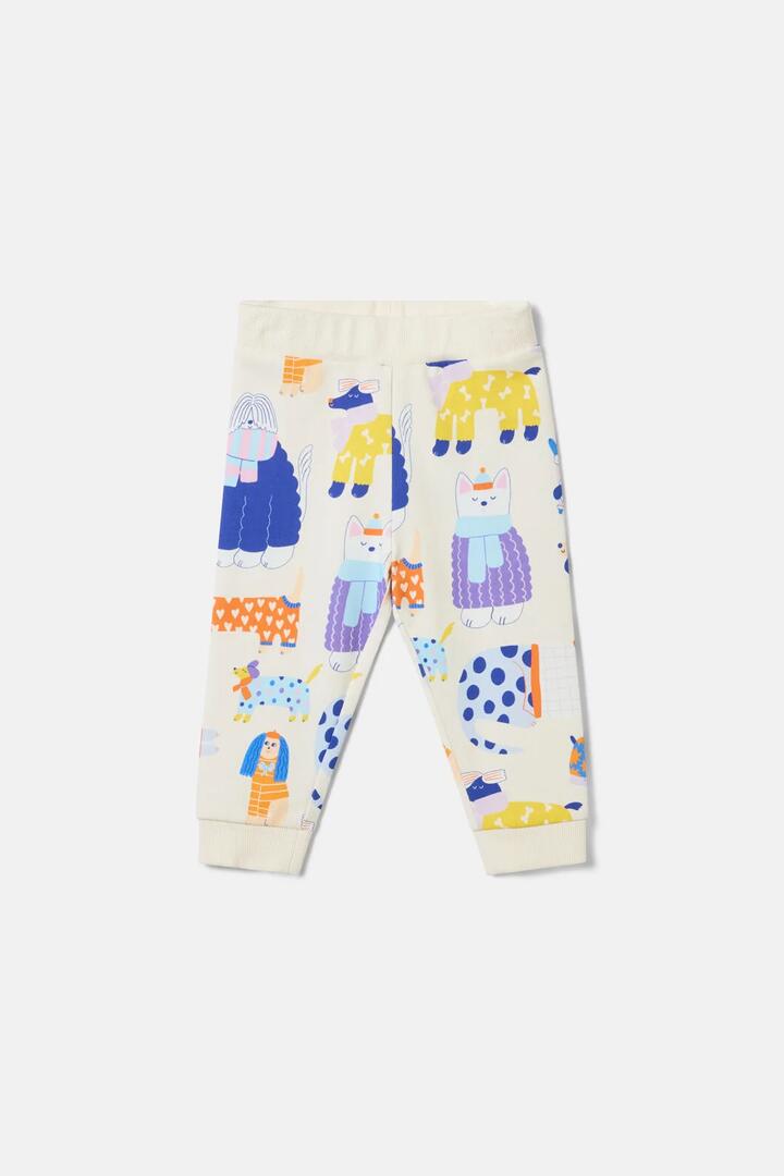 Image of a model wearing Pants. Product name - Dogs Baby Track Pants in Multi colour by brand - Gorman