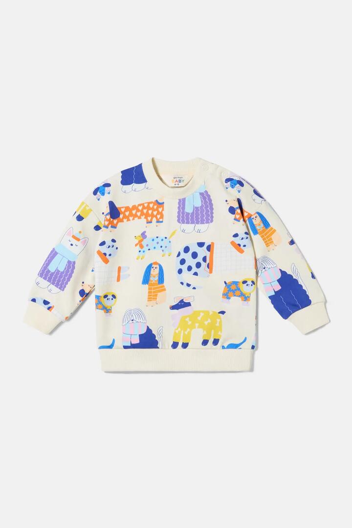Image of a model wearing Outerwear. Product name - Dogs Baby Sweater in Multi colour by brand - Gorman