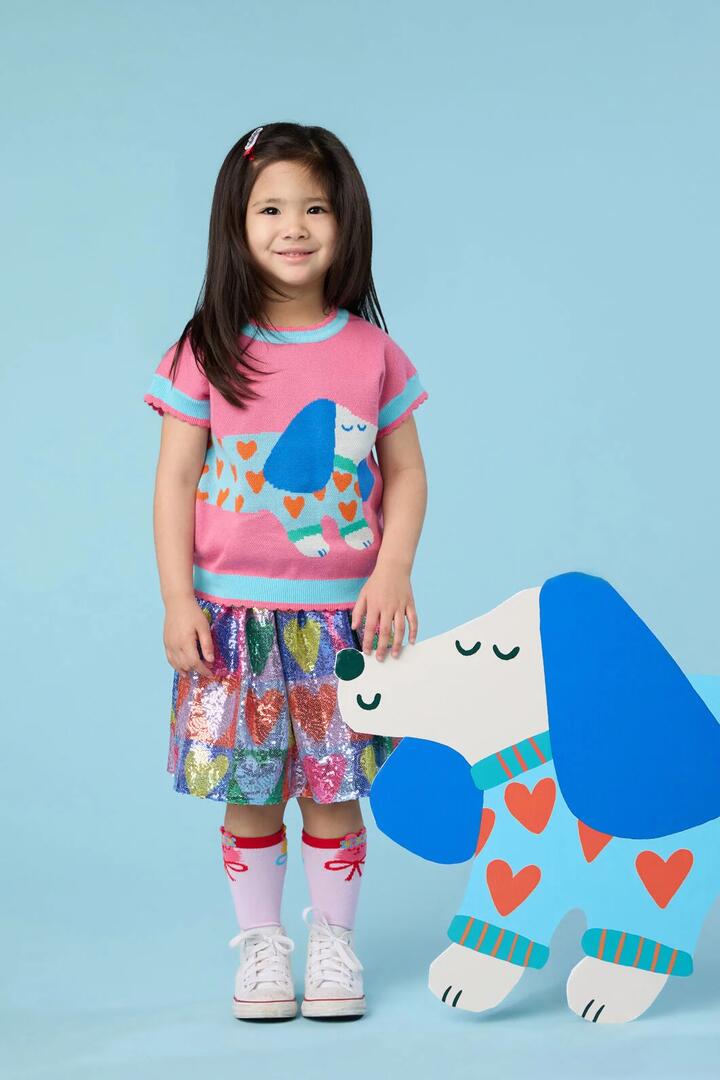 Image of a model wearing Skirts. Product name - Hearts Kids Sequins Skirt in Multi colour by brand - Gorman