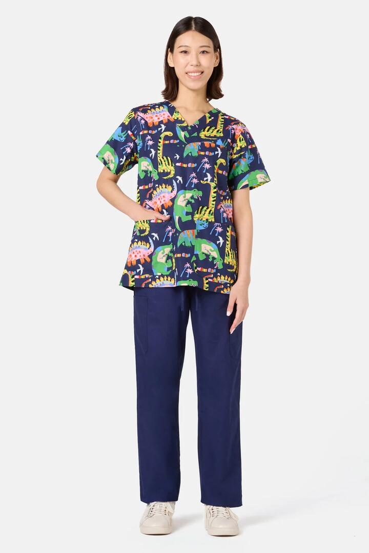 Image of a model wearing Uniforms & Workwear. Product name - Dreamy Dinos Mixed Scrub Set in Navy colour by brand - Gorman