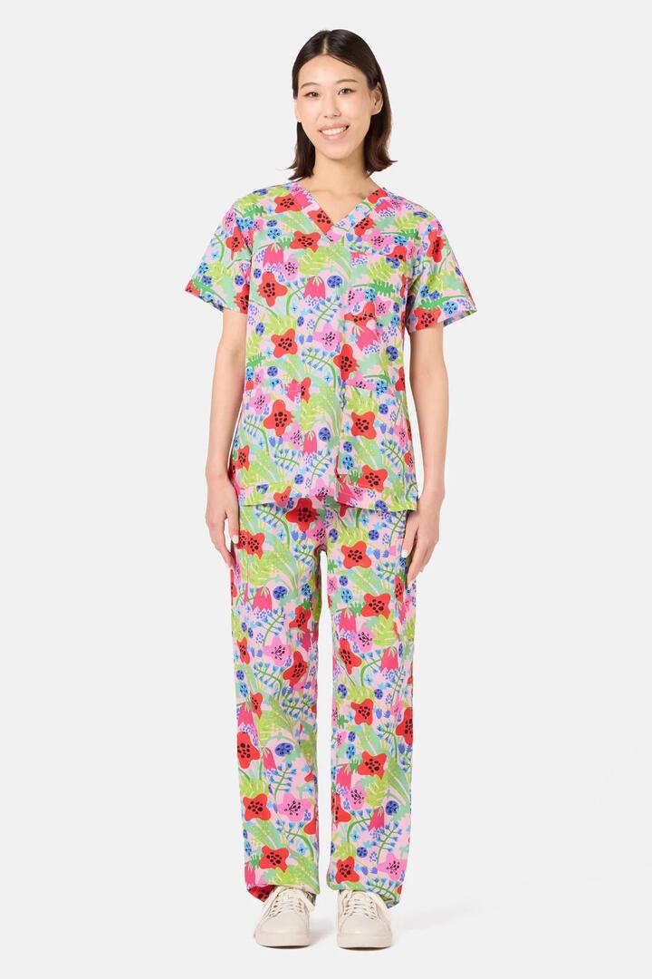Image of a model wearing Uniforms & Workwear. Product name - Flower Field Scrub Set in Multi colour by brand - Gorman
