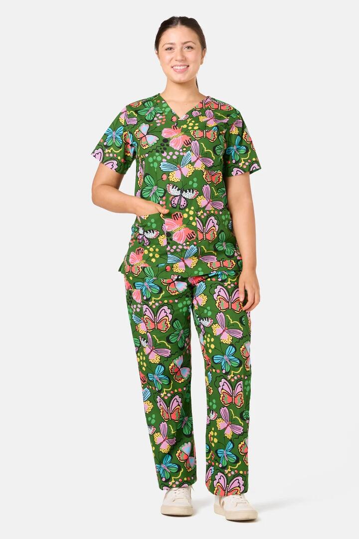 Image of a model wearing Uniforms & Workwear. Product name - Papillon Scrub Set in Green colour by brand - Gorman