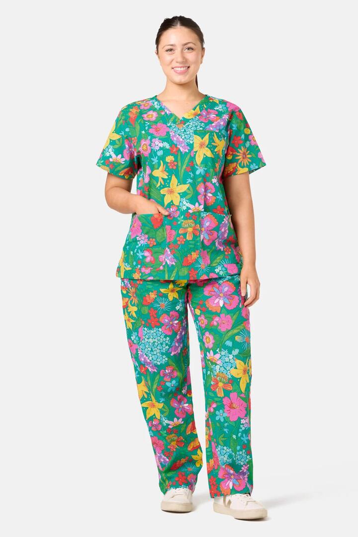 Image of a model wearing Uniforms & Workwear. Product name - Cottage Garden Scrub Set in Multi colour by brand - Gorman