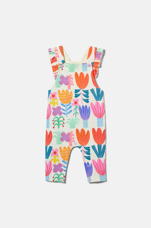 Image of a model wearing Pants. Product name - Tulips Baby Overalls in Multi colour by brand - Gorman