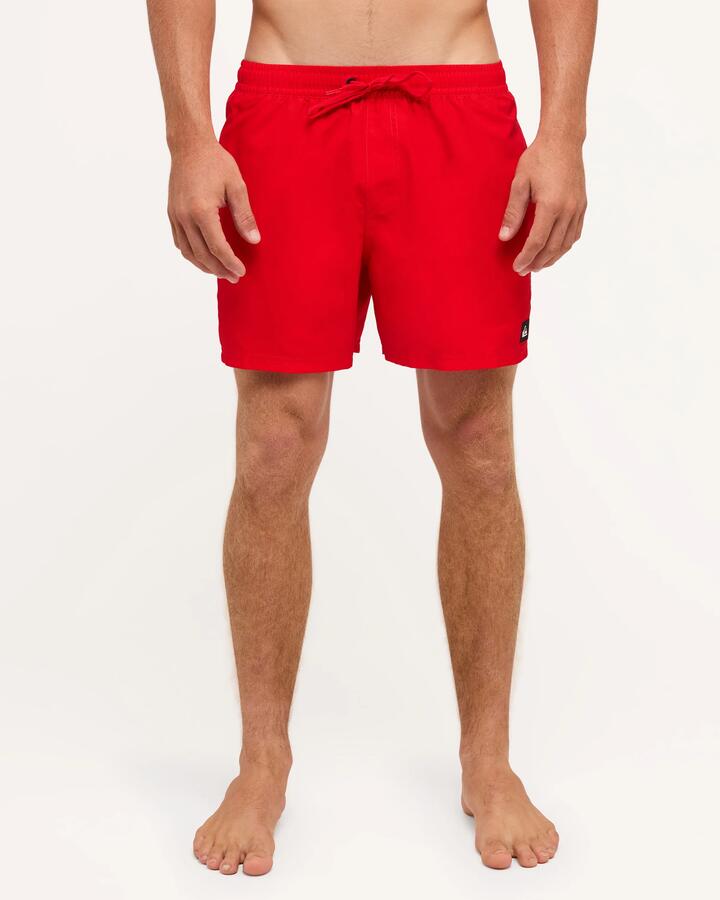 Image of a model wearing Shorts. Product name - Quiksilver Mens Everyday Solid 15" Volley Shorts High Risk Red in High Risk Red colour by brand - Quiksilver