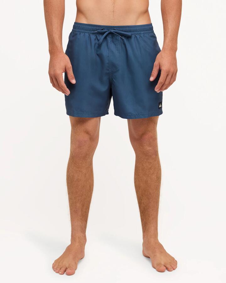 Image of a model wearing Shorts. Product name - Quiksilver Mens Everyday Solid 15" Volley Shorts Dark Denim in Dark Denim colour by brand - Quiksilver
