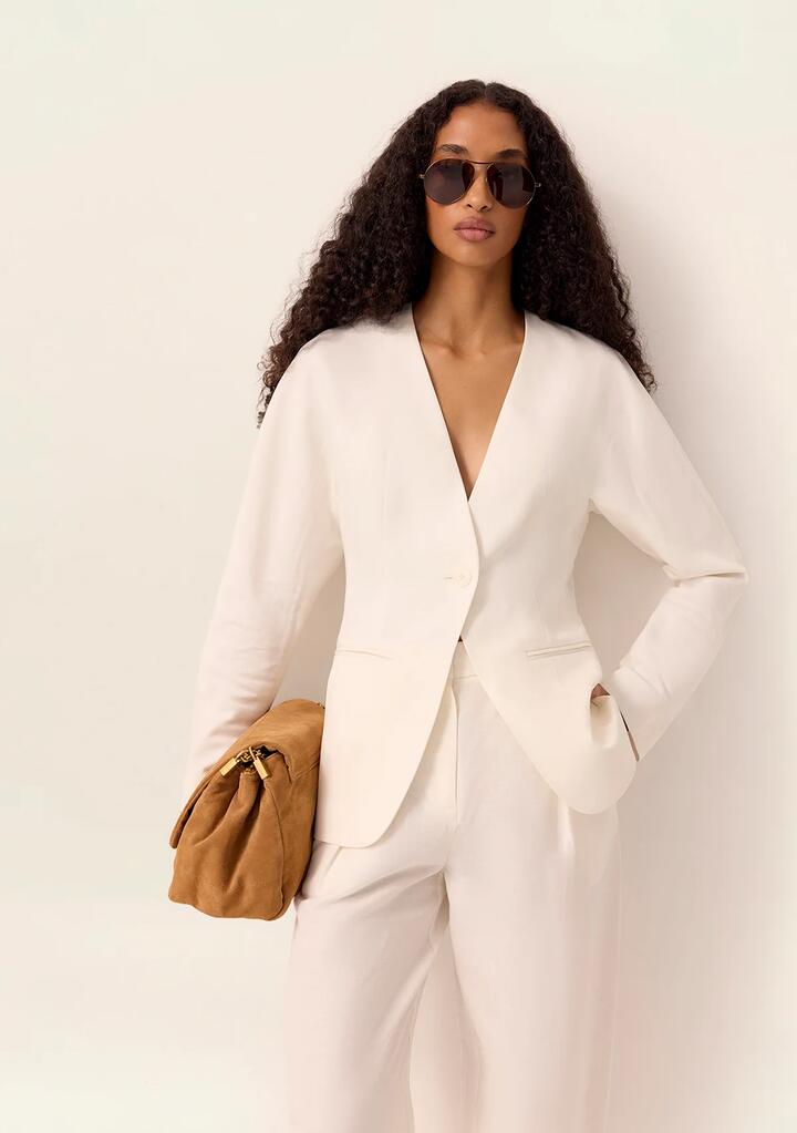 Image of a model wearing Outerwear. Productname: Cecilia Blazer in Off White colour by brand - MOS The Label