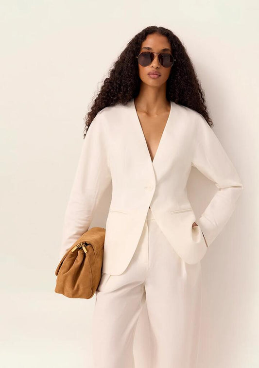 Image of a model wearing Outerwear. Productname: Cecilia Blazer in Off White colour by brand - MOS The Label