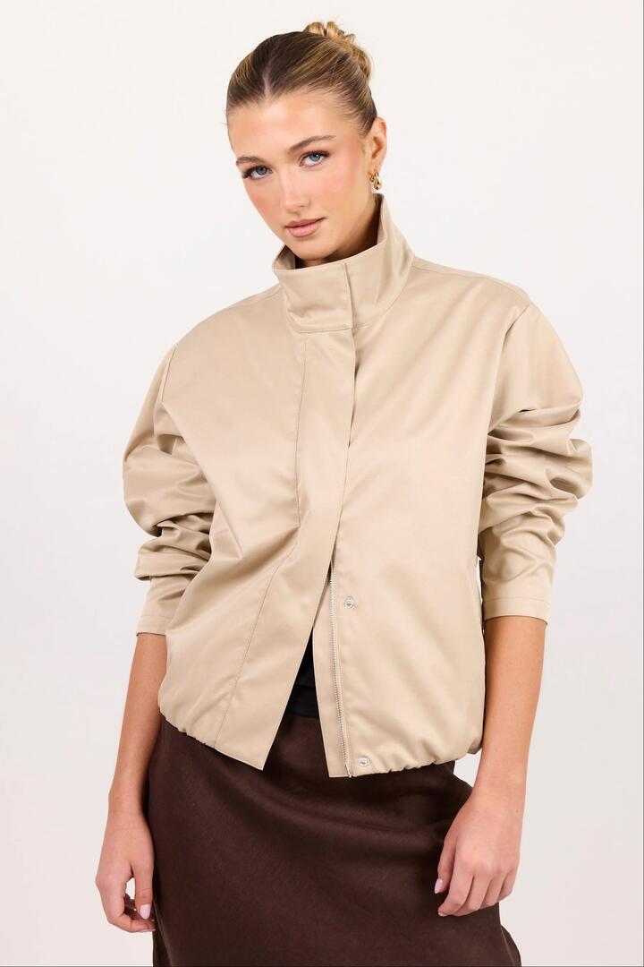 Image of Coats & Jackets. Product name - Landscape Taupe Funnel Neck Track Jacket in Taupe colour by brand - Among the Brave